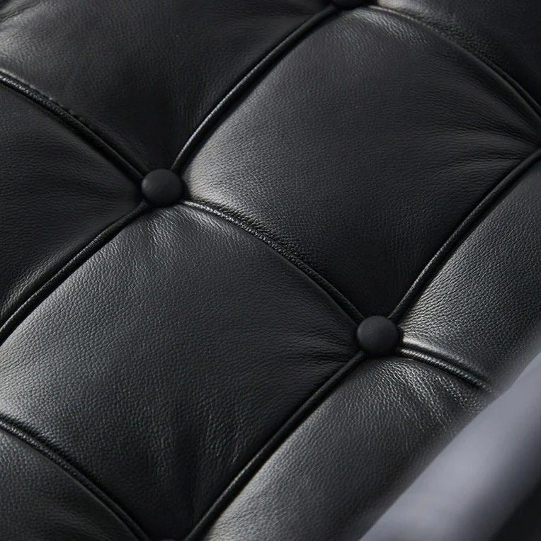 MAGNUS leather Armless Settee